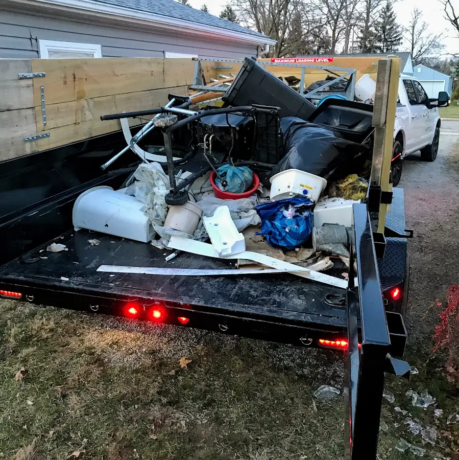 Roll-off dumpster delivered to a residential driveway in Braselton